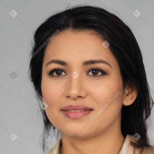 Joyful latino young-adult female with medium  black hair and brown eyes