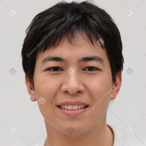 Joyful asian young-adult male with short  brown hair and brown eyes