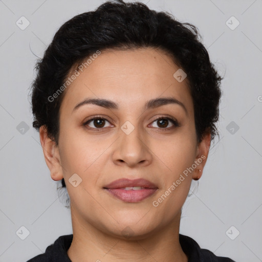 Joyful latino young-adult female with short  brown hair and brown eyes