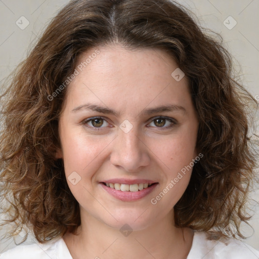 Joyful white young-adult female with medium  brown hair and green eyes