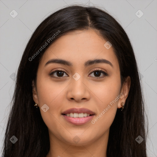 Joyful latino young-adult female with long  brown hair and brown eyes