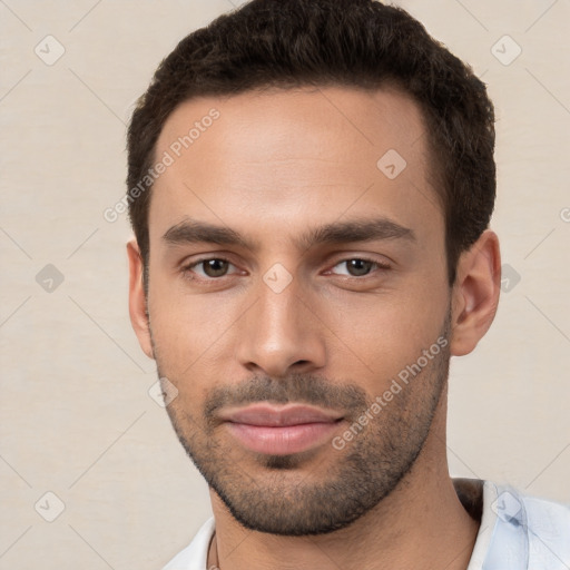 Neutral white young-adult male with short  brown hair and brown eyes