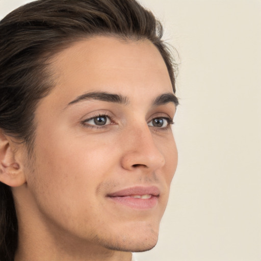 Neutral white young-adult male with medium  brown hair and brown eyes