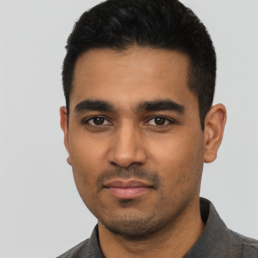 Neutral latino young-adult male with short  black hair and brown eyes