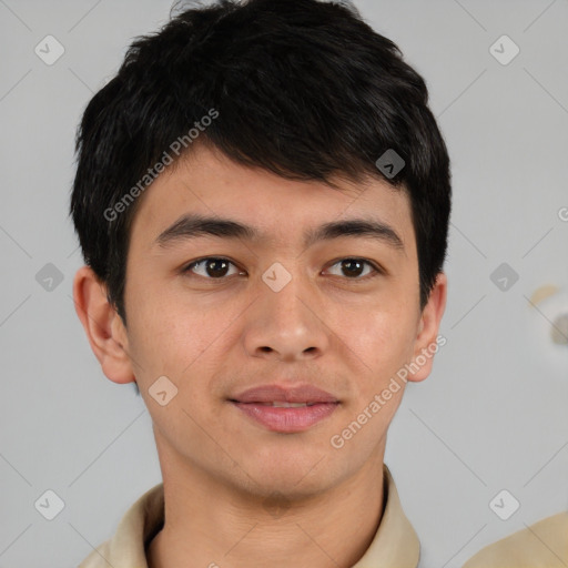 Joyful asian young-adult male with short  brown hair and brown eyes