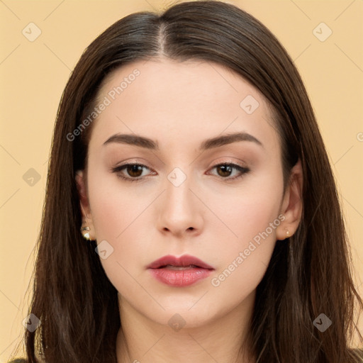 Neutral white young-adult female with long  brown hair and brown eyes