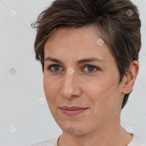 Joyful white adult female with short  brown hair and brown eyes