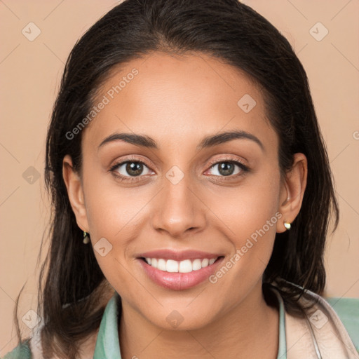 Joyful white young-adult female with long  brown hair and brown eyes