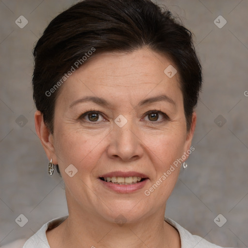 Joyful white adult female with short  brown hair and brown eyes