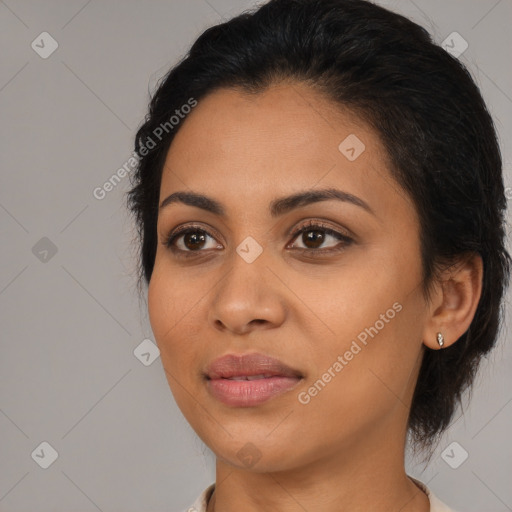 Joyful latino young-adult female with medium  black hair and brown eyes