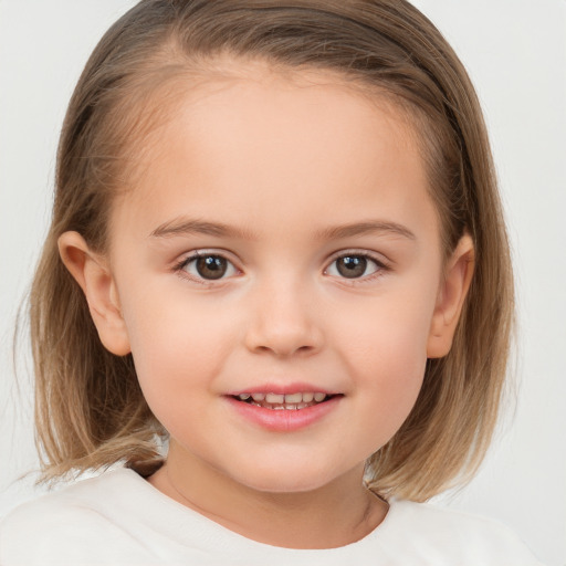 Joyful white child female with medium  brown hair and brown eyes