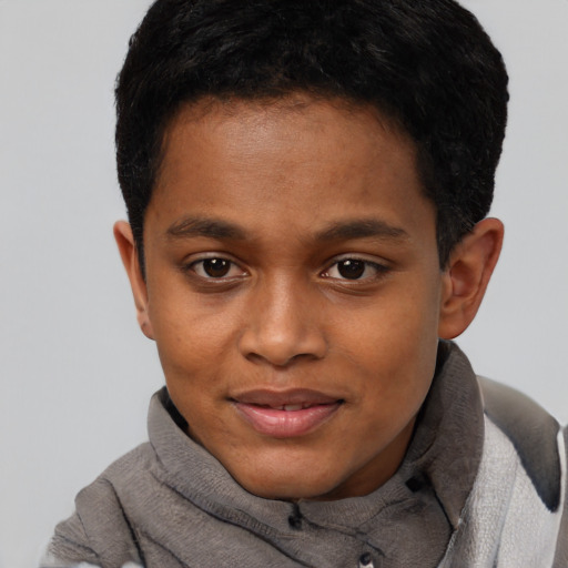 Joyful black young-adult male with short  brown hair and brown eyes