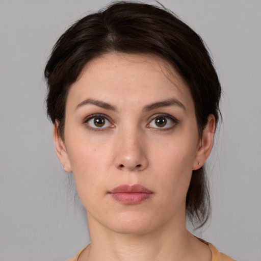 Neutral white young-adult female with medium  brown hair and brown eyes