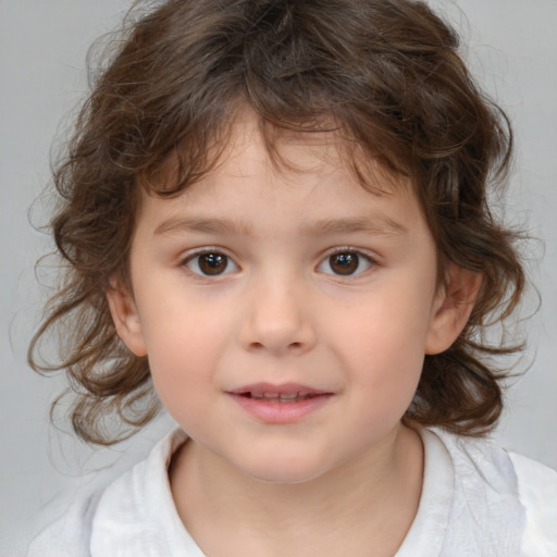 Joyful white child female with medium  brown hair and brown eyes