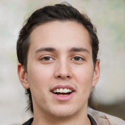 Joyful white young-adult male with medium  brown hair and brown eyes