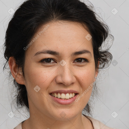 Joyful white adult female with medium  brown hair and brown eyes