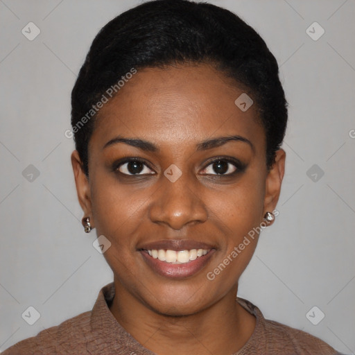 Joyful black young-adult female with short  black hair and brown eyes