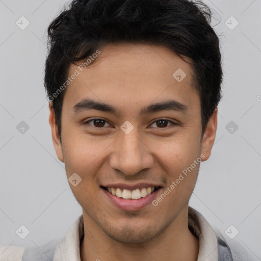 Joyful latino young-adult male with short  brown hair and brown eyes