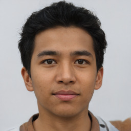 Neutral asian young-adult male with short  brown hair and brown eyes