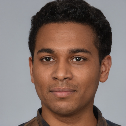 Neutral latino young-adult male with short  brown hair and brown eyes