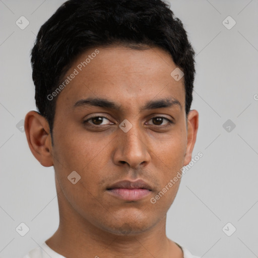 Neutral latino young-adult male with short  black hair and brown eyes