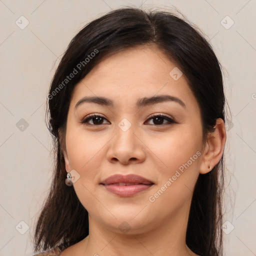 Joyful asian young-adult female with medium  brown hair and brown eyes