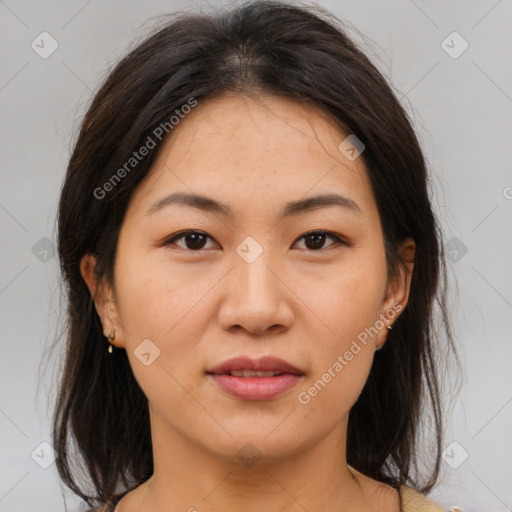 Joyful asian young-adult female with medium  brown hair and brown eyes