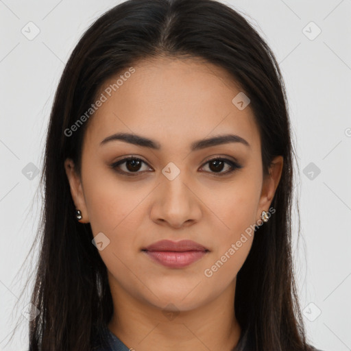 Joyful latino young-adult female with long  brown hair and brown eyes