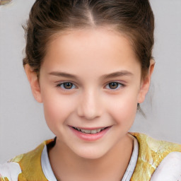 Joyful white child female with short  brown hair and brown eyes