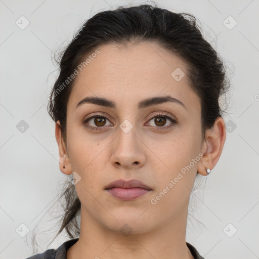 Neutral white young-adult female with medium  brown hair and brown eyes