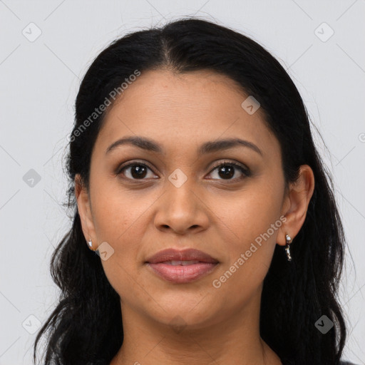 Joyful latino young-adult female with long  black hair and brown eyes