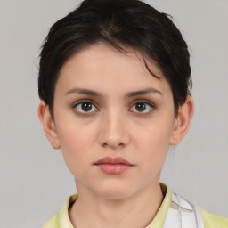 Neutral white young-adult female with short  brown hair and brown eyes