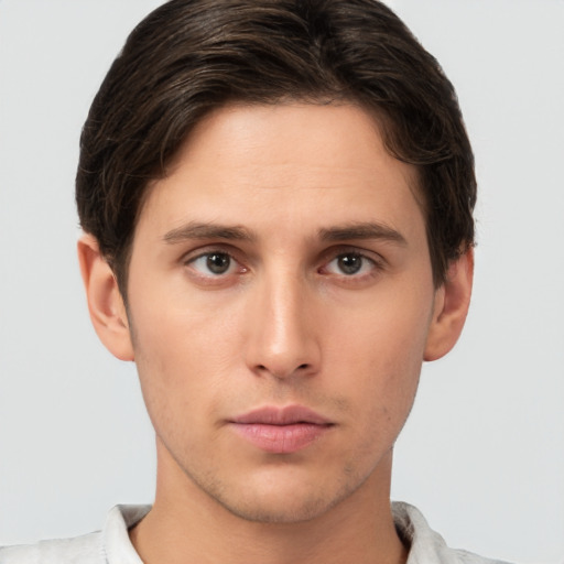 Neutral white young-adult male with short  brown hair and brown eyes