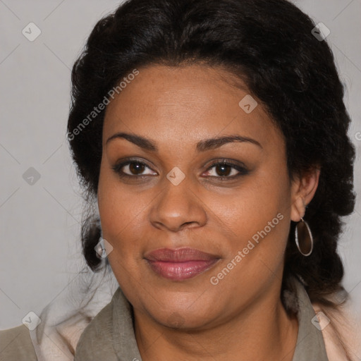 Joyful black adult female with medium  brown hair and brown eyes