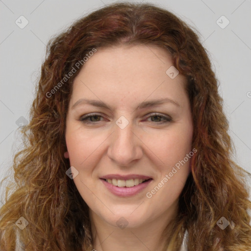 Joyful white young-adult female with long  brown hair and green eyes