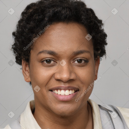 Joyful black young-adult female with short  brown hair and brown eyes