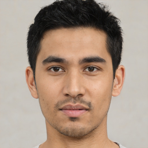 Neutral latino young-adult male with short  black hair and brown eyes