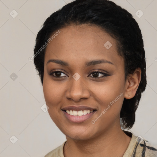 Joyful latino young-adult female with short  black hair and brown eyes