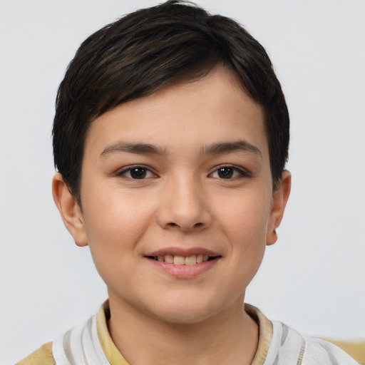 Joyful white child female with short  brown hair and brown eyes