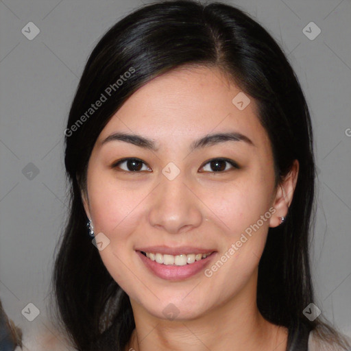 Joyful white young-adult female with long  brown hair and brown eyes