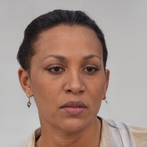 Neutral black adult female with short  brown hair and brown eyes