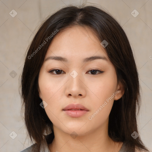 Neutral asian young-adult female with medium  brown hair and brown eyes