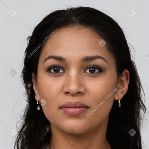 Joyful latino young-adult female with long  brown hair and brown eyes