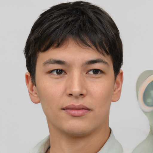 Neutral asian young-adult male with short  brown hair and brown eyes