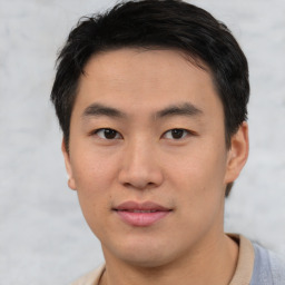 Neutral asian young-adult male with short  brown hair and brown eyes