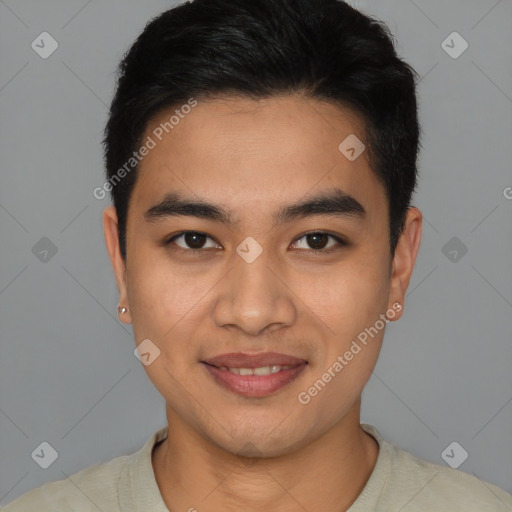 Joyful latino young-adult male with short  brown hair and brown eyes