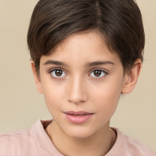 Joyful white child female with short  brown hair and brown eyes