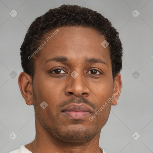 Neutral latino young-adult male with short  brown hair and brown eyes