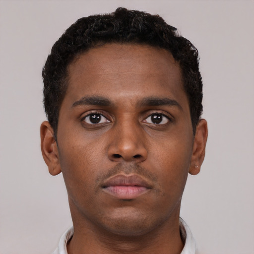 Neutral black young-adult male with short  brown hair and brown eyes