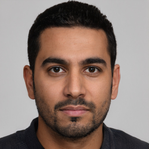 Neutral latino young-adult male with short  black hair and brown eyes